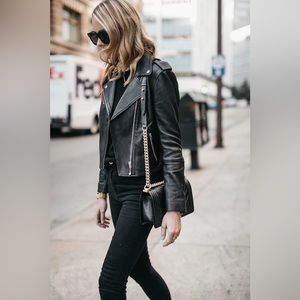 Womens Wilsons soft Leather Black moto jacket size medium.